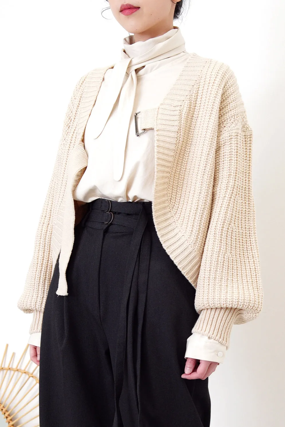 Beige knit cardigan in strap buckle