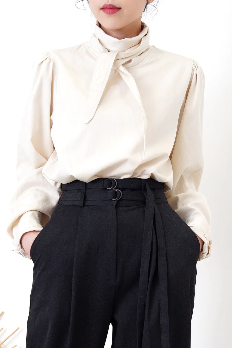 Beige knit cardigan in strap buckle